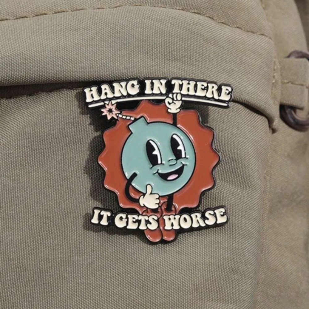 Blue red bomb Hang in There uplifting enamel pin backpack bag hat clothes denim